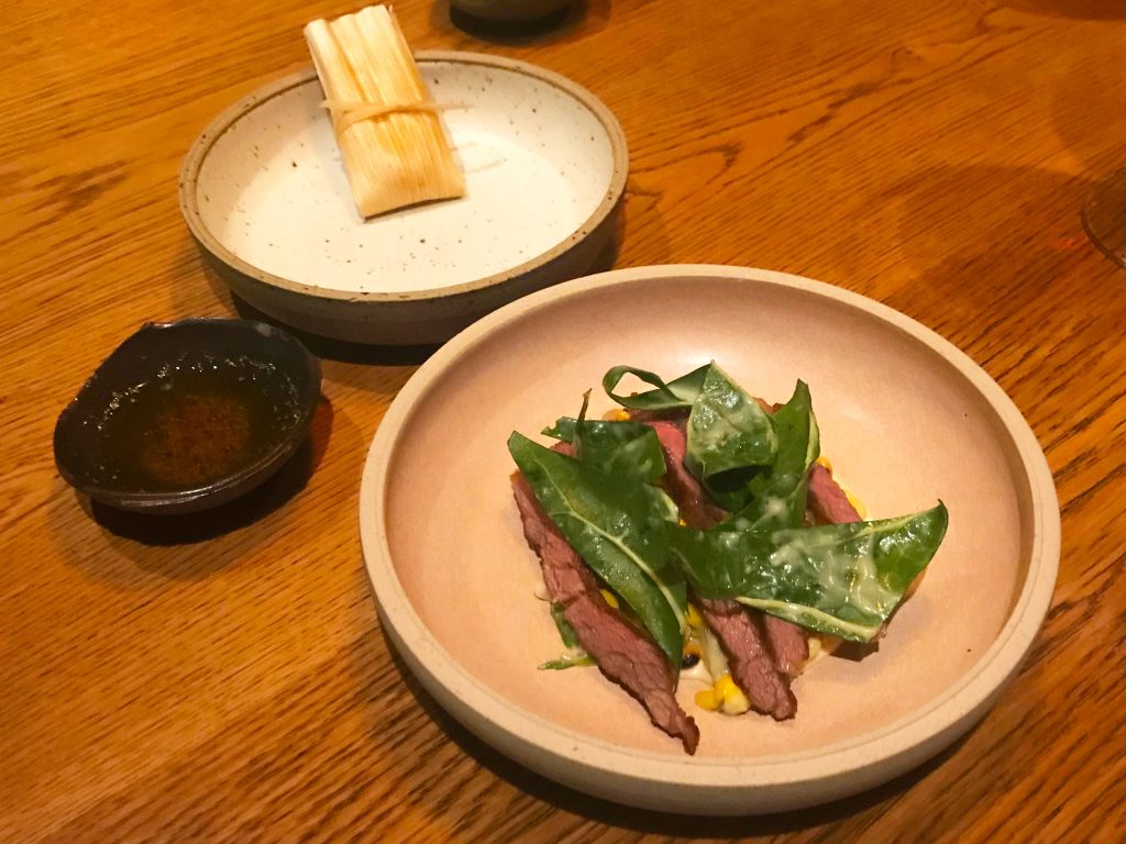 Iberico pork cooked over charcoal; toasted corn dressing, tamales & meadowsweet butter